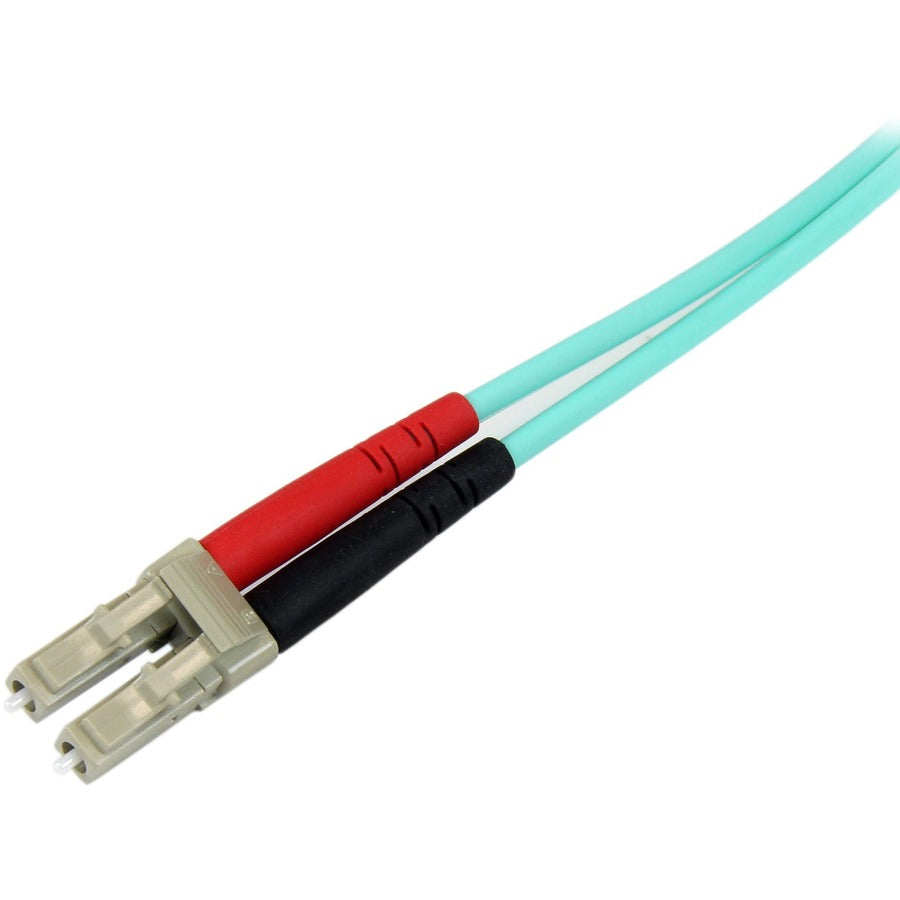 Câble à fibre optique StarTech.com de 10 m - 10 Gb Aqua - Duplex multimode 50/125 - LSZH - LC/SC - OM3 - Câble de raccordement à fibre optique LC vers SC A50FBLCSC10
