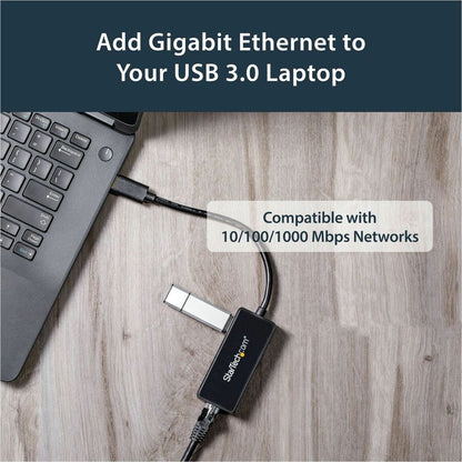 Adaptateur réseau StarTech.com USB 3.0 vers Gigabit Ethernet avec port USB - Noir USB31000SPTB