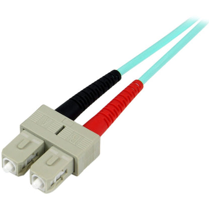 StarTech.com Câble à fibre optique multimode LC/UPC vers SC/UPC OM3 de 1 m (3 pi), duplex intégral 50/125 Zipcord, 100 G, cordon de raccordement à fibre optique LSZH A50FBLCSC1